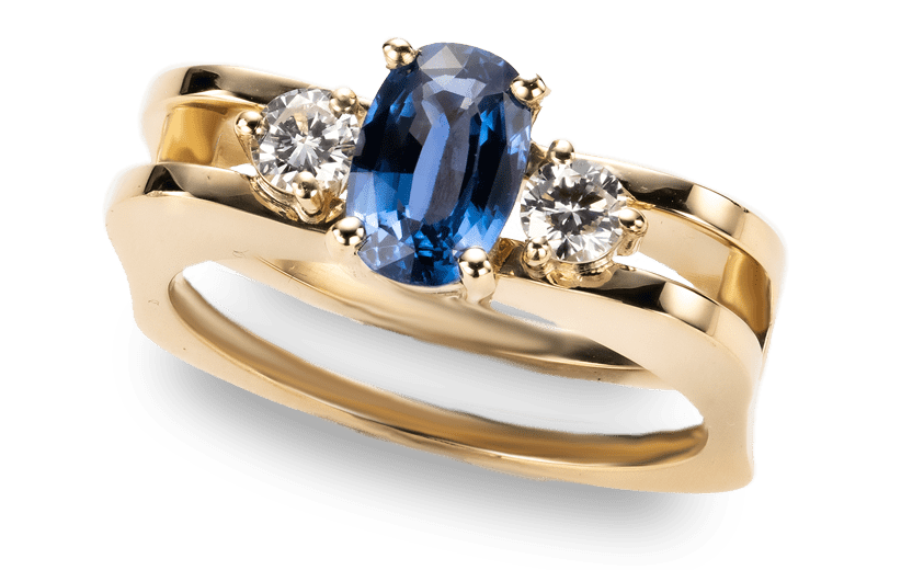 Geelgouden ring gezet met blauwe saffier en briljant