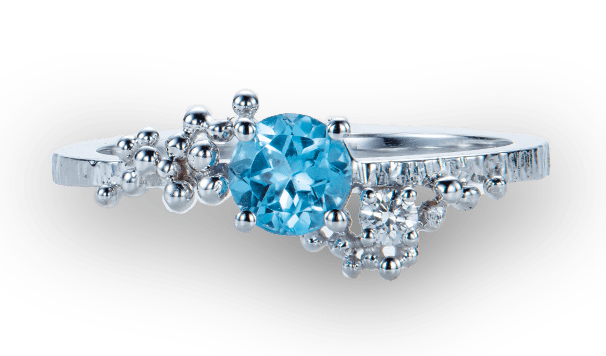Witgouden ring met blauwe topaas en diamant