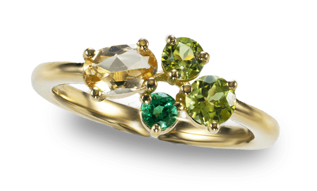 Geelgouden ring met imperial topaas, smaragd en peridoot