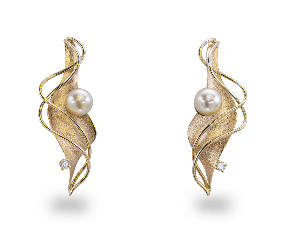 Oorstekers mixt goud 18kt, groter ontwerp en speciale kleurtinten in het goud verwerkt.